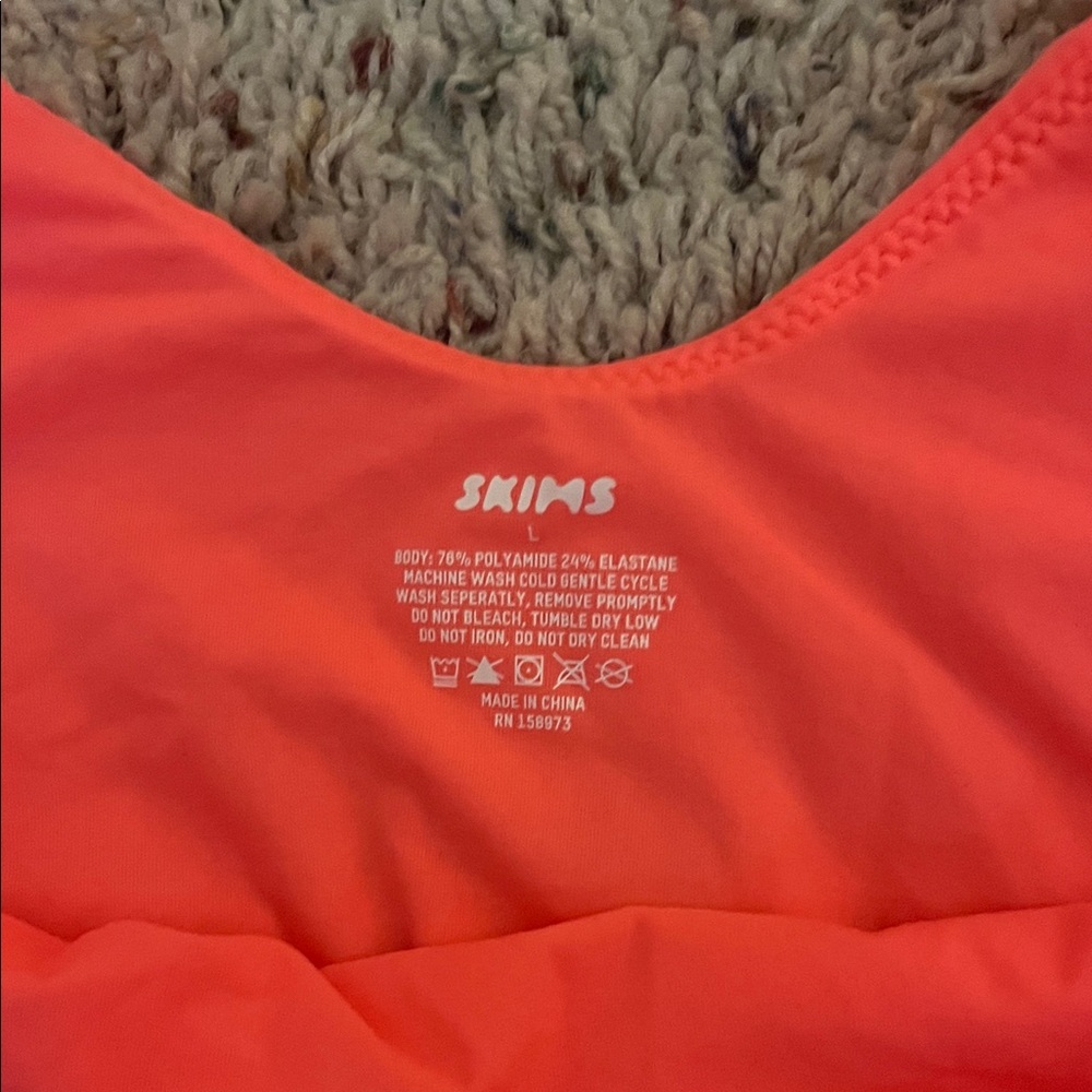 SKIMS Bodysuit in Neon Coral - Picture 2 of 3